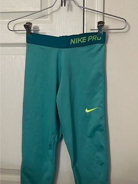 Nike Kids Teal Leggings with Neon Yellow Swoosh
